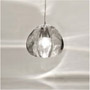 Once cool, a hole is drilled in the glass, and each pendant is polished and given a clear, glossy finish.