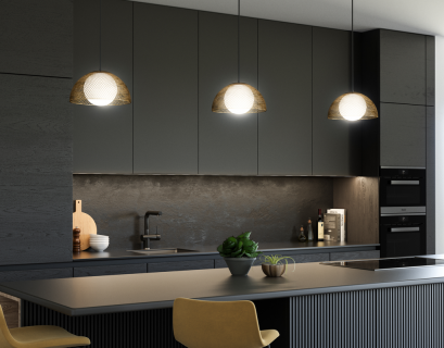 Three Haven Pendants by Alora Mood over a kitchen counter island with dark cabinets.