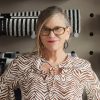 portrait of Sandy Chilewich in front of fabric samples